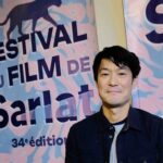 Akihiro Hata, devant un mur porteur / Photo : © Vincent Raymond